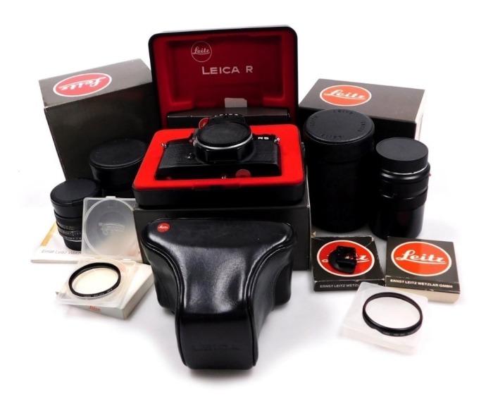A Leitz Leica R5 camera, boxed with instructions, together with an Ever Ready case, Elmarit-R 1:2, 8/135mm lens, Summicron-R 1:2/35mm lens, filters, all boxed.