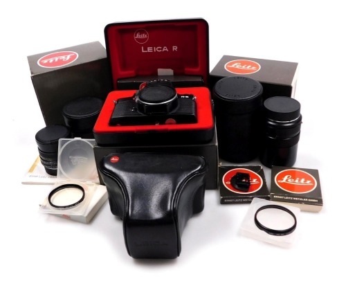 A Leitz Leica R5 camera, boxed with instructions, together with an Ever Ready case, Elmarit-R 1:2, 8/135mm lens, Summicron-R 1:2/35mm lens, filters, all boxed.