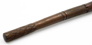 A late 19thC carved ethnographic war club, with hatched and fluted carving, 76cm wide. - 3