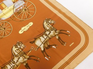 A Hermes Coach and Saddle silk scarf, designed by Ledoux, 86cm x 86. - 2