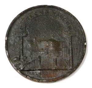 A St Helena Tavern Rotherhithe metal sixpence, by W J Taylor, showing an archway leading into a garden with buildings beyond, the pillars to the arch marked 'dinners dress'd' and 'tea gardens', 38mm wide