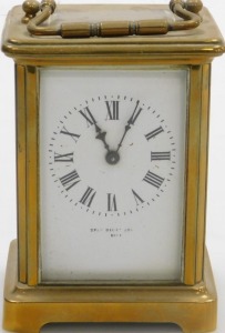 A late 19thC brass cased carriage clock, rectangular enamel dial bearing Roman numerals, single barrel movement, the case of conventional form, with key, 12cm high. - 2