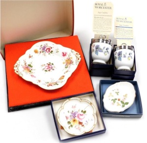 A Royal Crown Derby porcelain Derby Posies pattern twin handled dish, further small box, Wedgwood Wild Strawberry pattern oval dressing table dish, and two Royal Worcester porcelain egg coddlers, all boxed. (5)