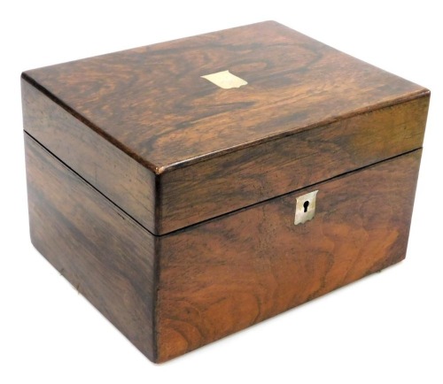 A Victorian rosewood work box, with mother of pearl escutcheons, the hinged lid opening to reveal a fitted interior, with semi secret side drawer, 17cm high, 28cm wide, 21cm deep.