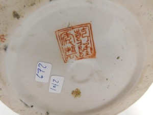 A 20thC Chinese famille noire jar and cover, decorated with reserves of flowering branches, against a dark blue ground with further flowers, six character seal mark to underside, 37cm high. - 2