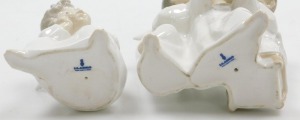 A Lladro porcelain figure of three cherubs, singing from a music sheet, and a further figure of a cherub, modelled seated with his hand on his cheek. (2) - 2