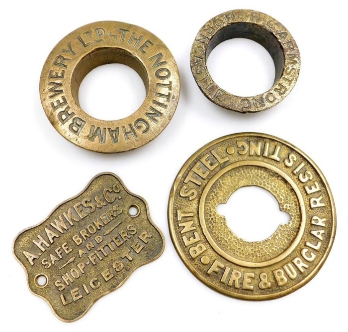 Two early 20thC brass safe plaques, including A Hawkes and Company, Safe Brokers and Shop Fitters Leicester, brass wheel cap for the Nottingham Brewery Limited, and another for RC Armstrong of Horncastle. (4)