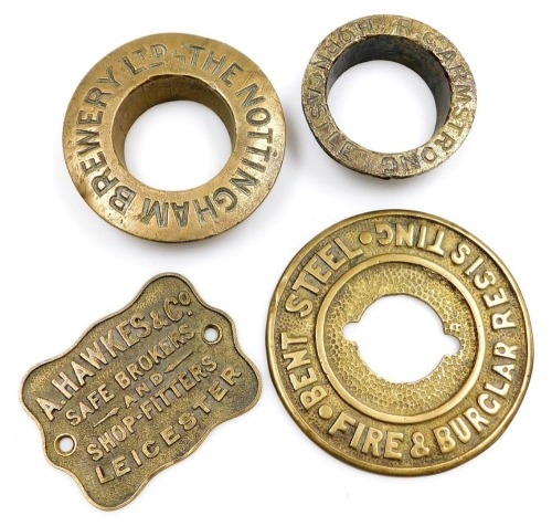 Two early 20thC brass safe plaques, including A Hawkes and Company, Safe Brokers and Shop Fitters Leicester, brass wheel cap for the Nottingham Brewery Limited, and another for RC Armstrong of Horncastle. (4)