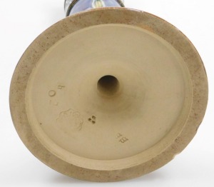 A late 19thC Doulton Lambeth stoneware candlestick, moulded with repeating bands of leaves and flowers, impressed and incised marks, 20.5cm high. - 2
