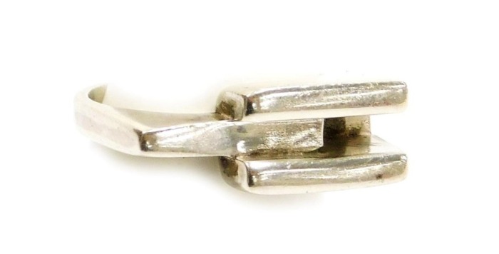 A silver ring, marked as Gucci, in a modernist design, stamped 925, 1551 F1, size P.