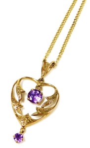 An Art Nouveau style 9ct gold and amethyst heart shaped pendant, 2.8g, on a curb link neck chain, with a bolt ring clasp.
