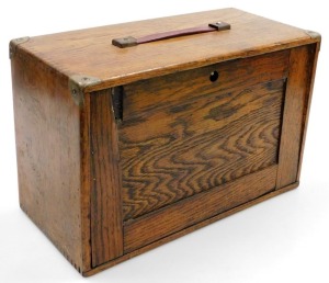 An early 20thC oak tool chest, with a drop down front enclosing four graduated drawers with recess below, holding some tools, 26cm x 41cm x 19cm. - 3