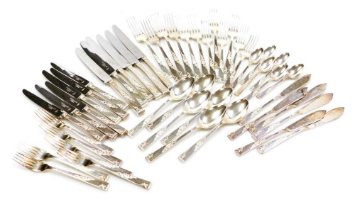 A group of silver plated cutlery, with embossed raised decoration, including table knives and forks, dessert and teaspoons, fish knives and forks.