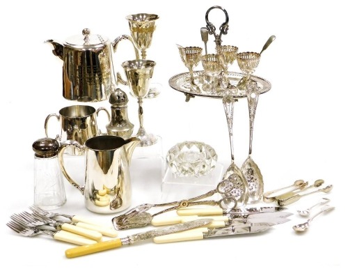 Plated wares, including a three piece tea set, an egg cruet, a pair of goblets, sugar sifters, and flatware. (a quantity)