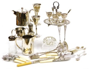 Plated wares, including a three piece tea set, an egg cruet, a pair of goblets, sugar sifters, and flatware. (a quantity)