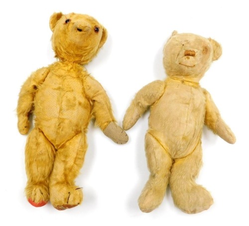 A Merrythought teddy bear, with a long snout, jointed arms and legs, 43cm high, and a straw filled teddy bear, 43cm high. (2)