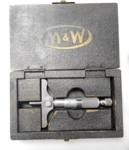 A Moore and Wright oak engineer's chest, the lockable front opening to reveal two short over three long graduated drawers, with a recess below, enclosing assorted tools, with key, 29cm high, 43cm wide, 22cm deep. - 5