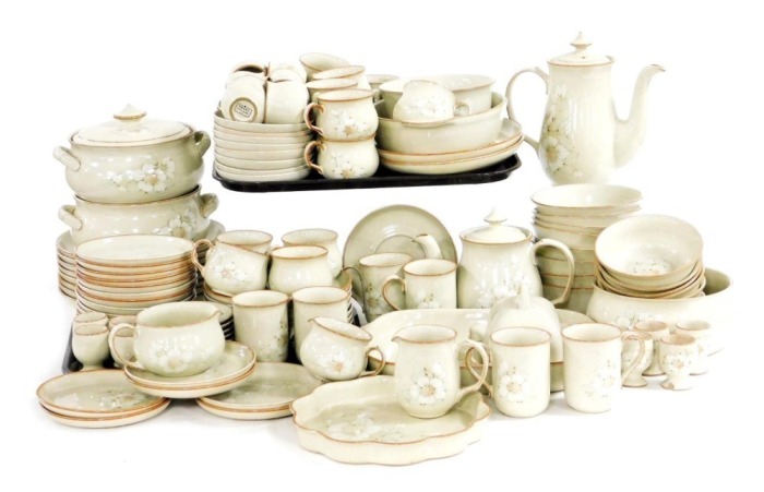 A Denby pottery Daybreak pattern dinner, tea and coffee service, including vegetable tureens and covers, dinner, dessert and side plates, tea and coffee cups and saucers, egg cups, coffee pot, cream jug, sugar bowls, serving dishes, etc. (a quantity)