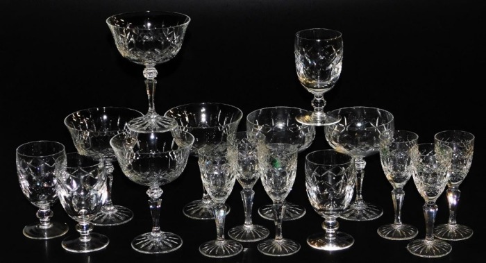 A group of Waterford, Galway and other cut glassware, including champagne and wine glasses.