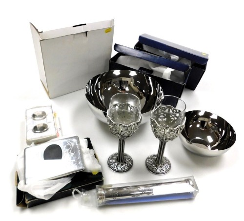 A group of collectables, including a pair of Malaysian Celtic pattern red wine goblets, a birth certificate scroll, and a photograph frame. (7)