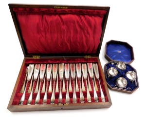 A Victorian silver plated fish canteen of cutlery, twelve place settings, mahogany cased, together with four Victorian silver plated salts, with later spoons, boxed. (2)