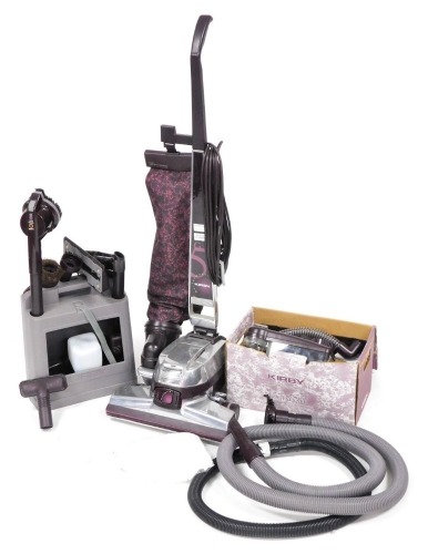 A Kirby Performance G5 vacuum and floor cleaner, with accessories.