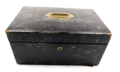 A Victorian black Morocco document box, with brass carrying handle and recess, named for the Marques of Huntly, opening to reveal a tray and otherwise vacant interior, stamped J Southcombe, Jermyn Street, London, 17cm x 36cm x24cm. (AF)