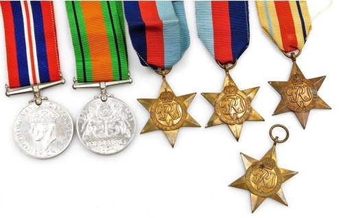 A group of six World War II medals, comprising Defence medal, 1939-1945 War medal, Africa Star (x2), 1939-1945 Star and the France Germany Star (x2).