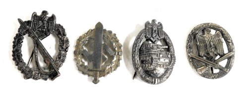 Four German cap badges, include a German Panzer Assault badge, a German Assault badge Superior, a Germany Assault badge Infantry, etc.,