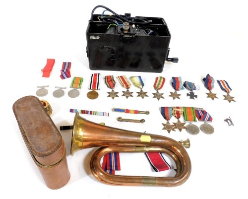 Various Second World War medals and later, including Africa Star, Burma Star, Atlantic Star, Germany and France Star, Defence medal, and various ribbons, bugle, and a field telephone, etc.
