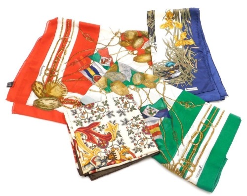 Four Aquascutum silk scarves, decorated with ducks and other birds in a reeded river bed, another with heraldic crest to centre surrounded by berries, vines, etc., and two silk chiffon scarves in red and green, decorated with various flags, shells, etc.