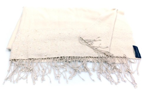 A Charles Jourdan Paris cream pashmina, decorated to each end with a panel of faceted beads and seed pearls with tasselled ends, 230cm long.
