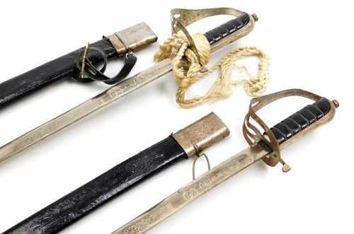 Two Indian reproduction cavalry swords.