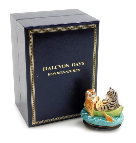 A Halcyon Days The Owl and The Pussycat enamel and porcelain bonbonniere, inscribed 1998, 5.5cm high, with certificate and outer box.