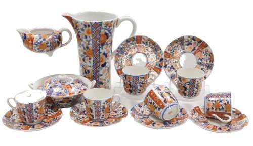 A mid 20thC Japanese Imari tea set and jug, comprising six tea cups, six saucers, milk jug, sucrier, and jug, all with traditional Imari style decoration, the jug 21cm high.