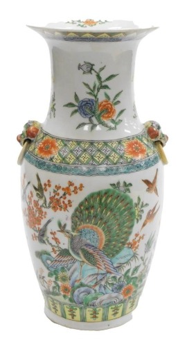 A Chinese Republic porcelain vase, with two ring handles, decorated with exotic birds and flowering shrubs, 35.5cm high.