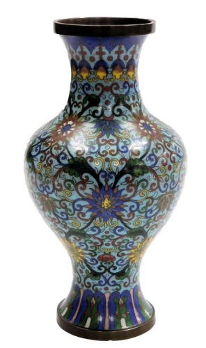 A Chinese cloisonne vase, of baluster form, decorated profusely with scrolling peonies within an lappet border, on a pale blue ground, 24cm high. (AF)