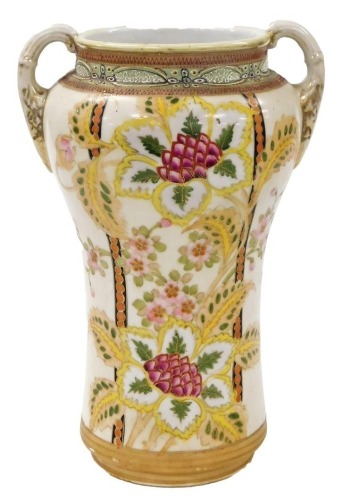An early 20thC Imperial Nippon porcelain vase, of twin handled form, painted with flowers, 28cm high.