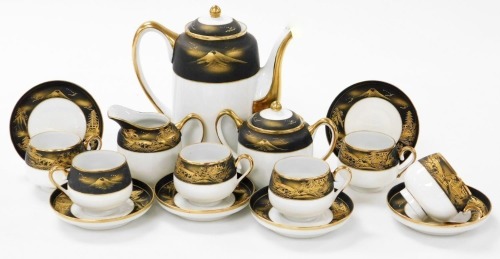 A 20thC Japanese eggshell porcelain coffee service, decorated with a band of matt black with gilt highlights depicting buildings before Mount Fuji, comprising teapot, two handled sugar bowl with lid, cream jug, six coffee cups and six saucers.