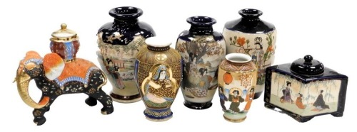 A collection of Japanese Satsuma ware, including five ovoid vases, a lozenge shaped pot pourri jar and cover, and an ornamental elephant, various sizes. (7)