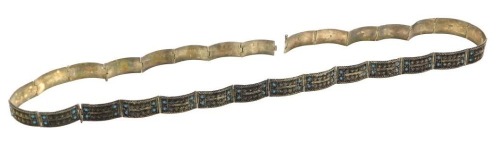 An Iranian white metal filigree and turquoise inset belt, 100cm long, together with five further links, 18cm long.