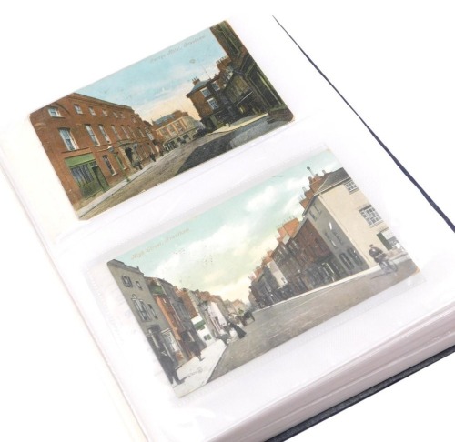 An album of early 20thC Grantham topographical postcards, include the High Street, George Hotel, Angel Hotel, and St Wulframs Church.