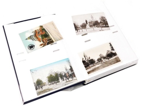 An album of Grantham topographical postcards, including general views, Dysart Park, The Market, and The Grantham Railway Disaster, September 19th 1906.