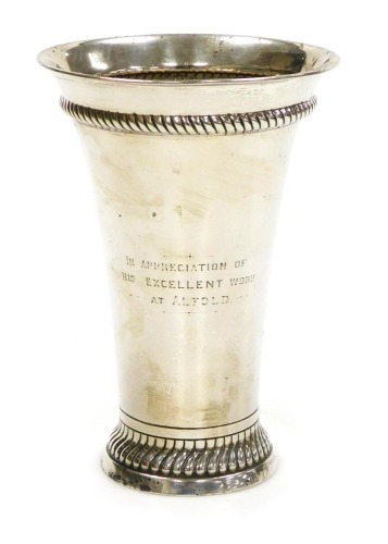 An Edward VII silver vase, with fluted banding, presentation engraved, Chester 1906, 8.91oz.