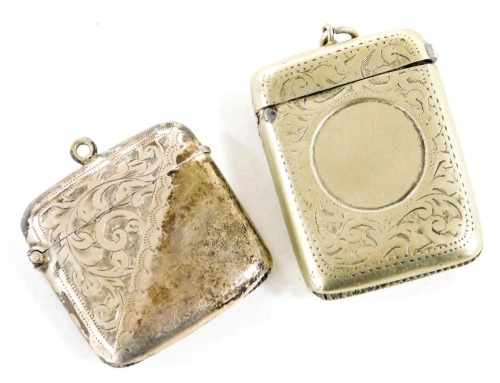 An Edward VII silver Vesta case, with foliate engraving, Birmingham 1902, 0.63oz, together with a silver plated Vesta case with foliate engraving, circular vacant reserve. (2)