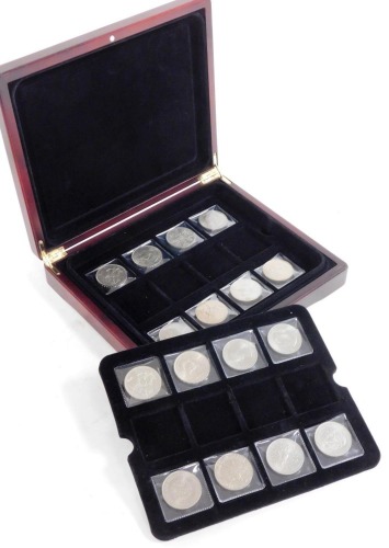 Two sets of uncirculated commemorative crowns, 1951-1981, boxed. (16)