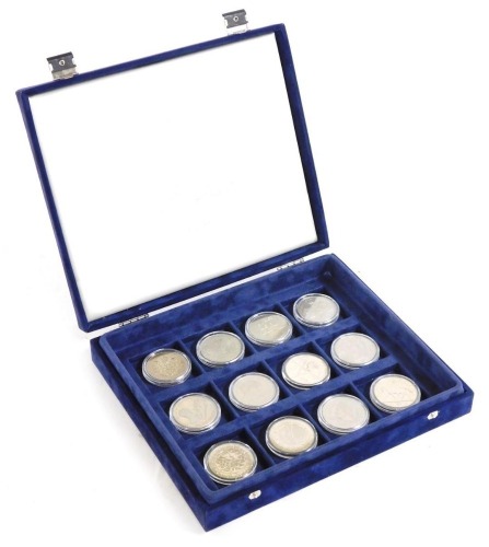 Twelve commemorative five pound coins, including Queen Elizabeth The Queen Mother's Centenary Birthday, The Millennium, Queen Elizabeth II Golden Jubilee 2002, In Memory of Diana Princess of Wales 1997, and The 50th Birthday of His Royal Highness The Prin