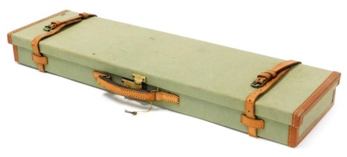 A Brady green fabric and tan leather bound gun case, 78cm wide.