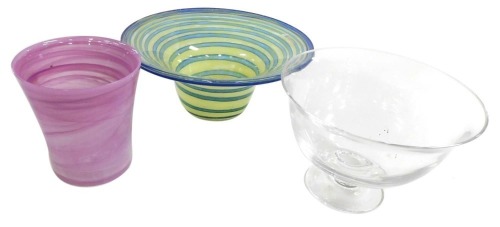 A cut glass fruit bowl, engraved to the foot 'Stony Gate C.C. Silver Jubilee 1969-1994', 23cm wide, a Spanish Lafiroe blue and yellow banded glass bowl, 31cm wide, and a violet swirl patterned vase, 15cm high. (3)