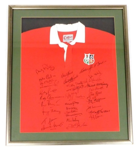 A Rugby Union British Lions Tour shirt, signed by various players, etc., including JPR Williams, JJ Maloney, A Neary, AB Carmichael, AD Ripley, AR Irvine, and TO Grace, framed and glazed, with certificate of authenticity verso, 79cm x 63cm.
